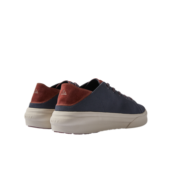 Atlantic men's navy and cappuccino sneakers facing away, highlighting heel with arch support and cushioned sole.