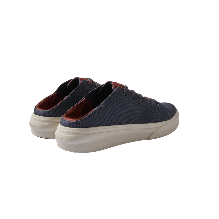Atlantic men's shoes facing left, rear and side view showing navy canvas upper and cushioned sole for beach comfort.