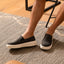 Pacific slip-on shoes in black facing left and right, highlighting comfort and durable, beach-inspired design.