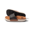 Sydnee Cutback Low women's black and tan slide sandals side view showing soft-rebound cushioned footbed and textured outsole