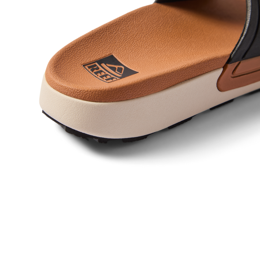Close-up of the heel area of the Sydnee Cutback Low sandal facing left, featuring soft-rebound cushioning and arch support.