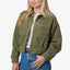 Woman wearing an olive Sammie Sherpa Jacket front view with textured comfort fabric and button closure designed for casual beachwear.