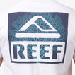 Back view of men's white Seafan Tee featuring blue coral reef graphic with REEF logo, beach-inspired comfort apparel.