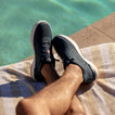 Shoreline Del Mar H2O navy sneakers facing left, close-up on upper and side, water-friendly with arch support and cushioning.