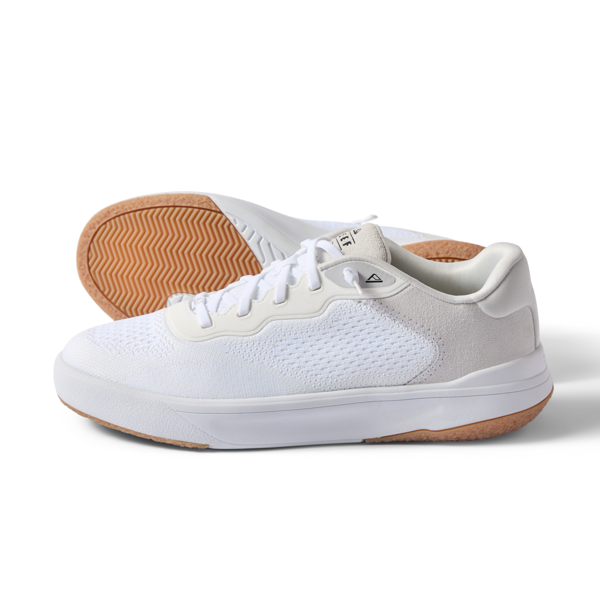Shoreline Del Mar white sneakers facing left with cushioned support and beach inspired comfort