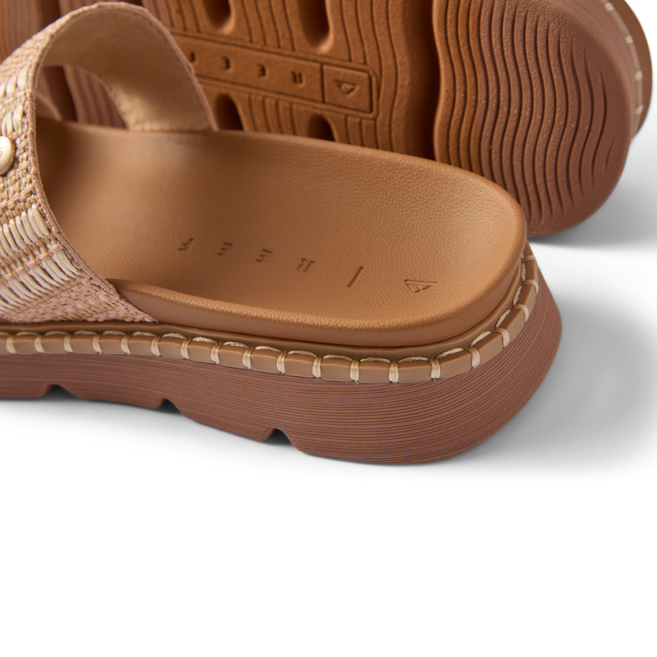 Close-up of the heel and footbed of the right Vista Luxe Thea sandal showing contoured arch support and durable outsole.
