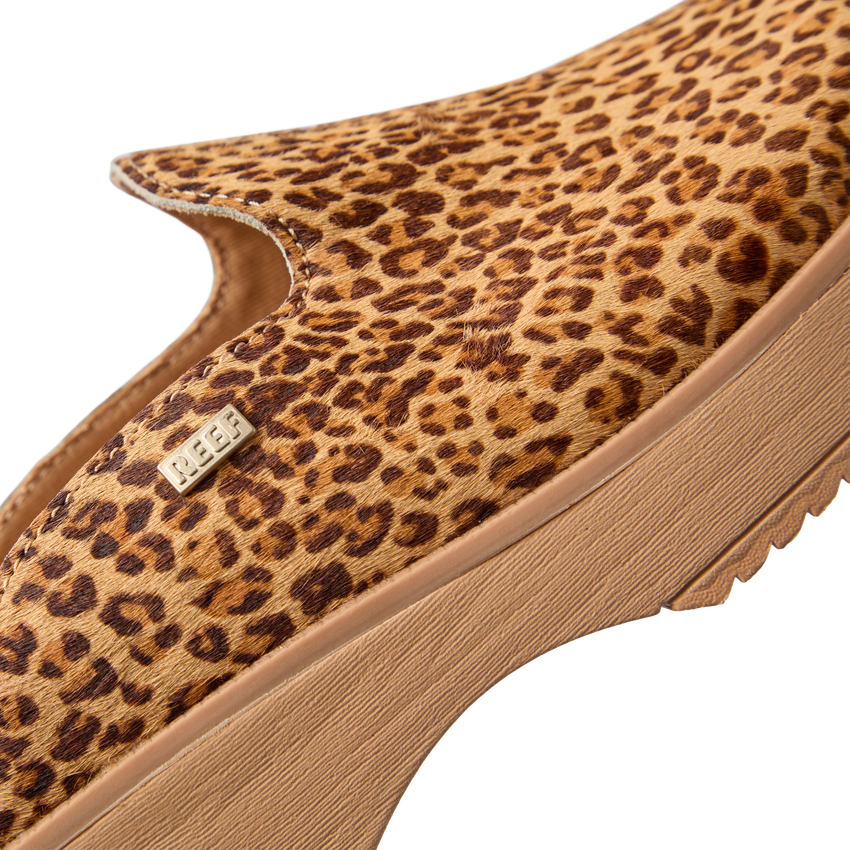 Vista Skye leopard platform clog facing left, close-up of suede upper and wedge sole with comfort support