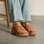 Vista Luxe Ava suede platform sandals with toes facing right, cushioned arch support, and crossover straps