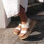 Vista Luxe Liah sandals facing forward, close-up of platform sandals with cushioned arch and buckle strap on feet.