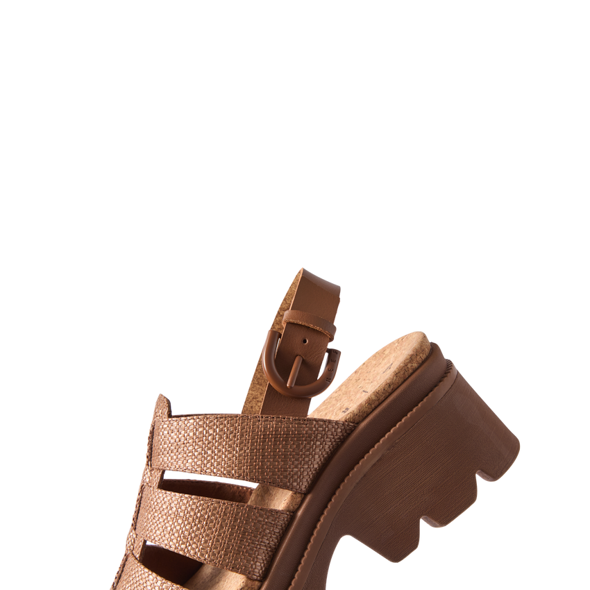 Vista Luxe Lucie women's sandal facing left, featuring chocolate raffia straps and comfort-focused cushioned sole.