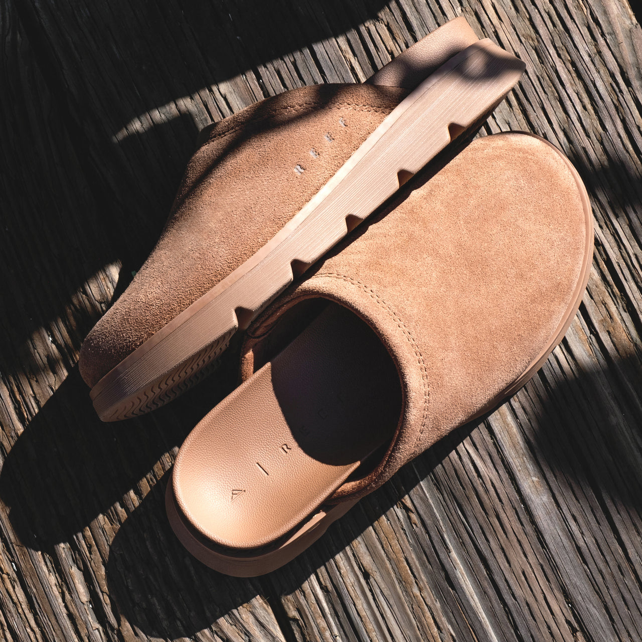 Vista Luxe Mariana clogs shown from above with closed-toe suede upper and side view of lightweight durable sole facing left