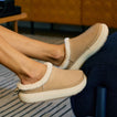 Weekend Low Brooke tan slip-on shoes facing right, shown in side view with soft fleece lining and cushioned soles