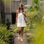 Woman walking outdoors wearing Willow Quinn sandals facing forward, showcasing comfort and surf-inspired design.