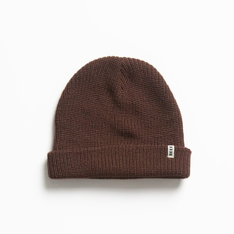 Alyx Beanie in brown knit fabric, close-up front view showing soft texture, designed for comfort and beach lifestyle.