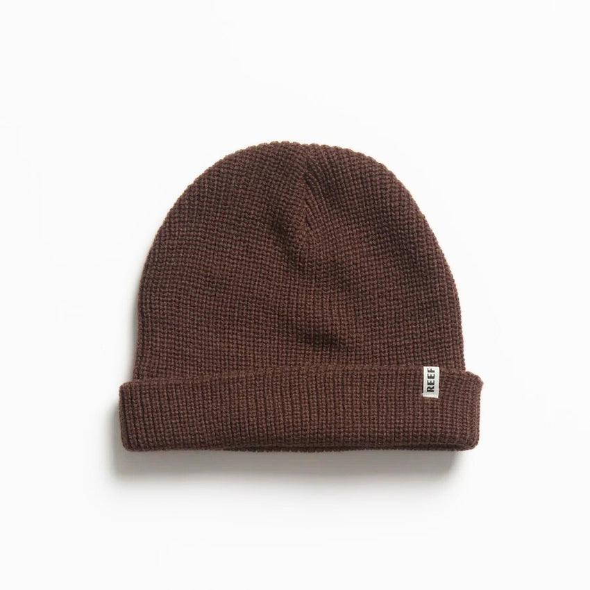 Alyx Beanie in brown knit fabric, close-up front view showing soft texture, designed for comfort and beach lifestyle.