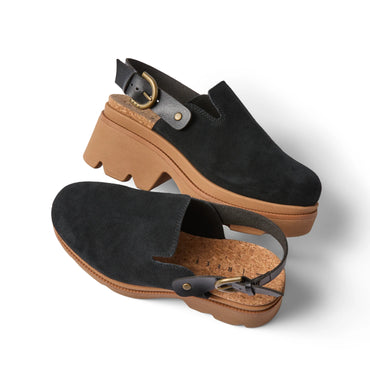 Vista Luxe Solene black suede platform clog angled right showing adjustable buckle strap and cushioned cork footbed