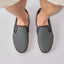 Del Mar Slip On facing forward, men's black and grey slip-on sneaker with lightweight mesh upper and cushioned sole for all-day comfort.