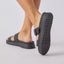 Vista Capri women's black sandals facing backward showing textured sole, surf-inspired comfort and durability features.