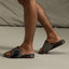 Pair of Fanning + Slide sandals facing left, brown and grey water-friendly men's slides with oversized airbag heel and arch support.